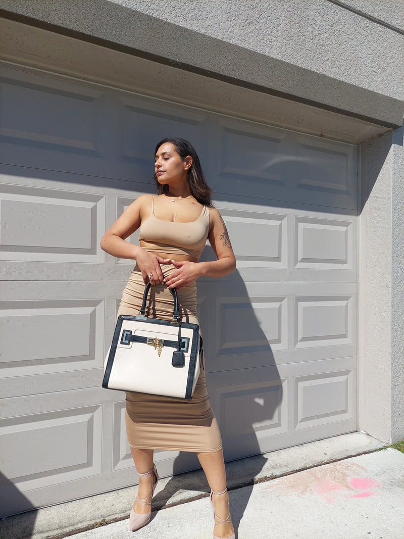 Sexy two piece skirt set that comes with a cut out sexy style crop top with a long khaki high waist or high rise skirt, crop top and skirt set is doubled layered, sexy clear high heels shoes, zade fashion, instagram pose ideas infront of garage door, garage door instagram pose ideas, aldo handbag