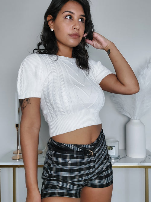 olive skin, medium wavy hair, beach waves, white knit crop top, plaid shorts, plaid mini shorts, cableknit top, cable knit crop top, perfect eyebrows